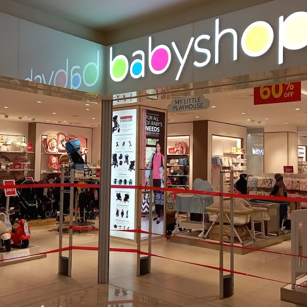 Babyshop The Curve logo