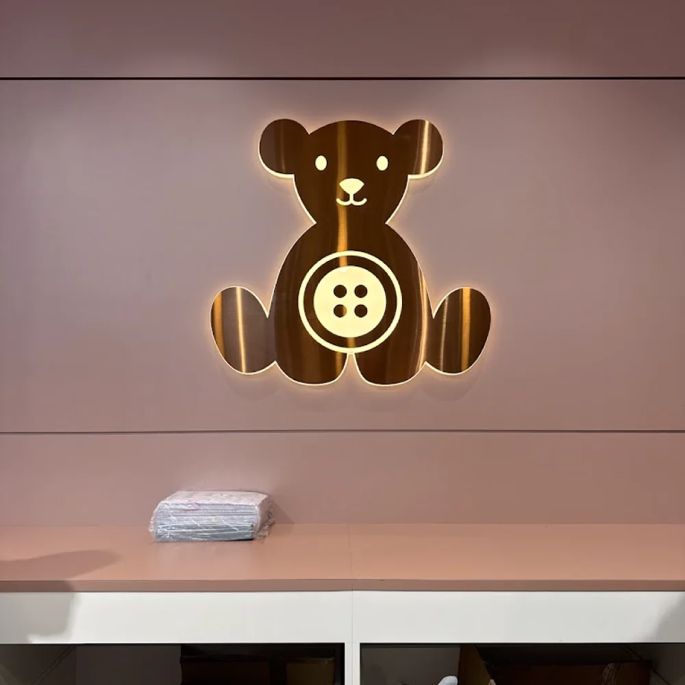 Tiny Button Concept Store (Quayside Mall) logo